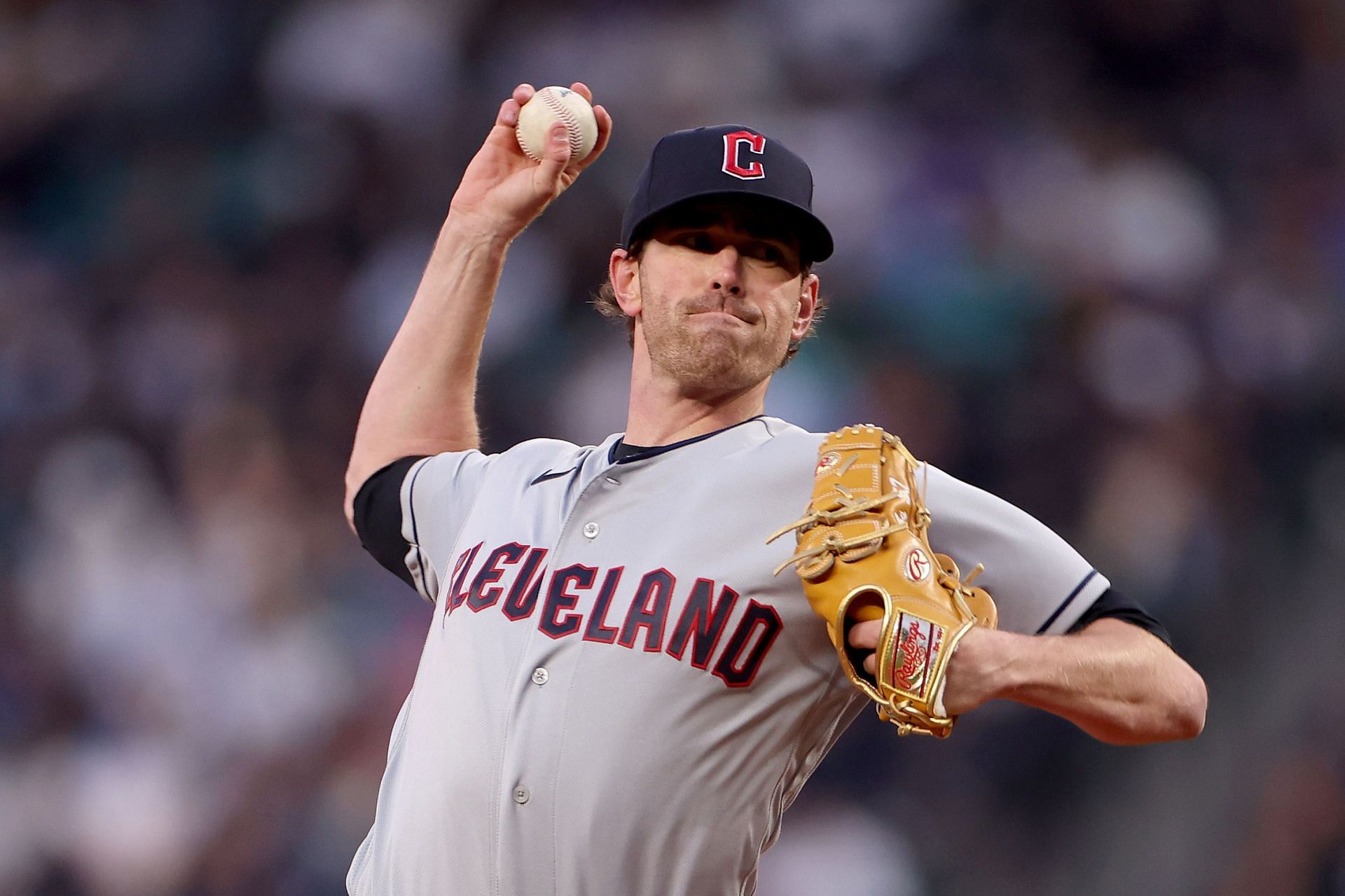 Cleveland Guardians vs Seattle Mariners: SEATTLE, WASHINGTON - MARCH 30: Shane of the Cleveland Guardians pitches during the first inning against the Seattle Mariners during Opening Day at T-Mobile Park on March 30, 2023, in Seattle, Washington. (Photo by Steph Chambers/Getty Images)